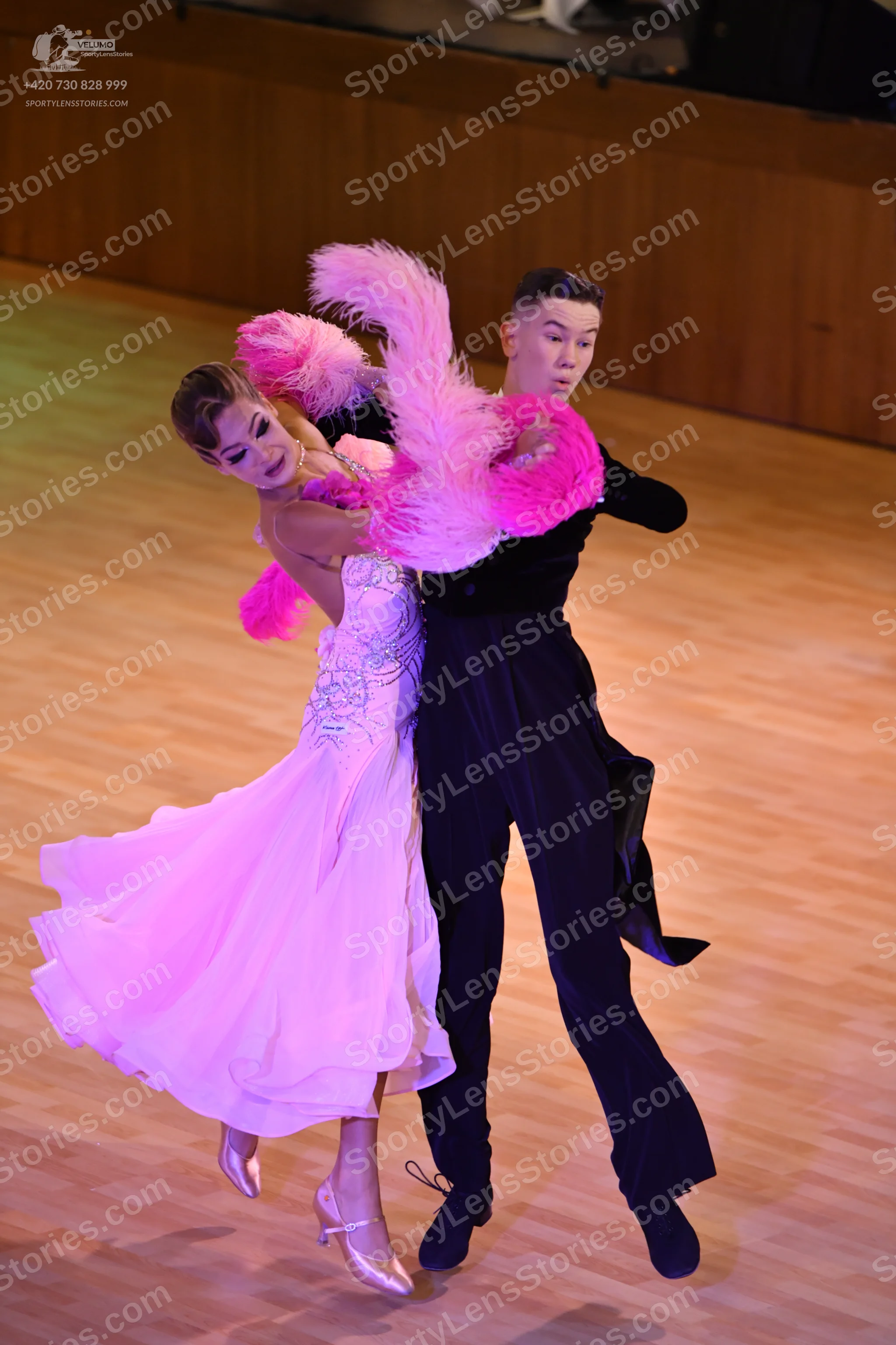 Dancesport competitor: ** Black tail suit with a subtle sequin pattern on the lapels and cuffs