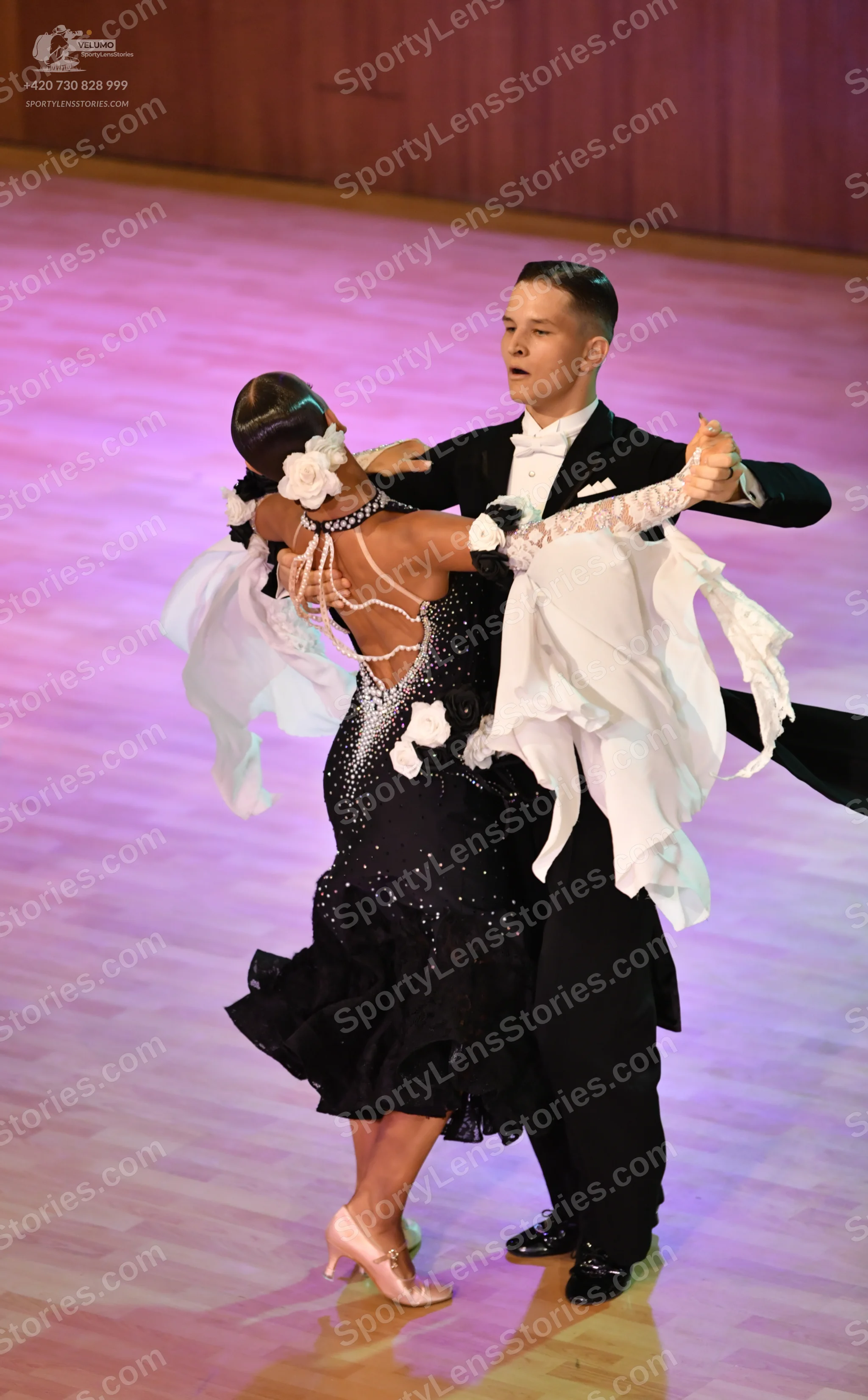 Dancesport competitor: ** Black Latin suit