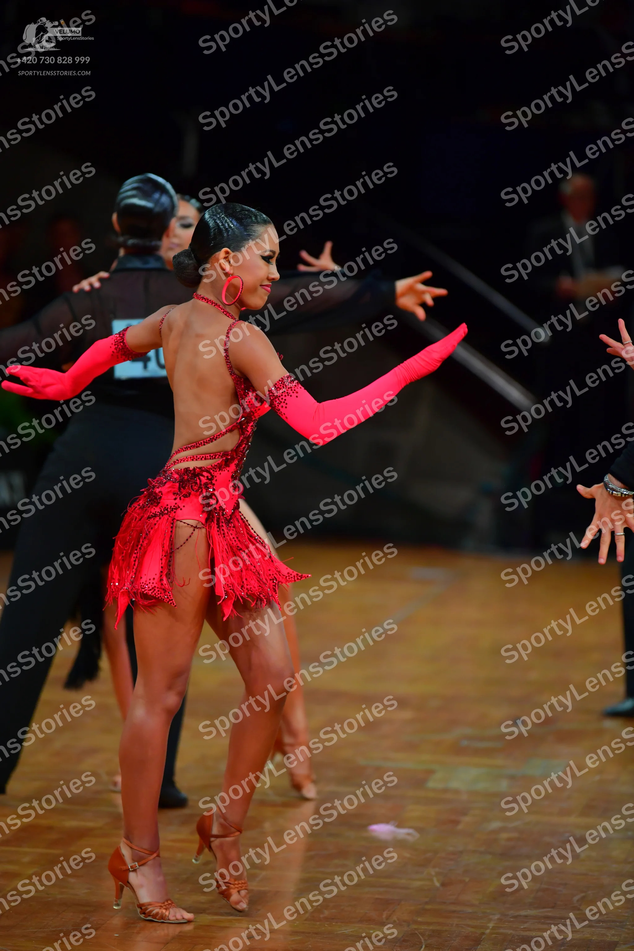 Dancesport competitor: Male dancer: black long-sleeved shirt and black trousers