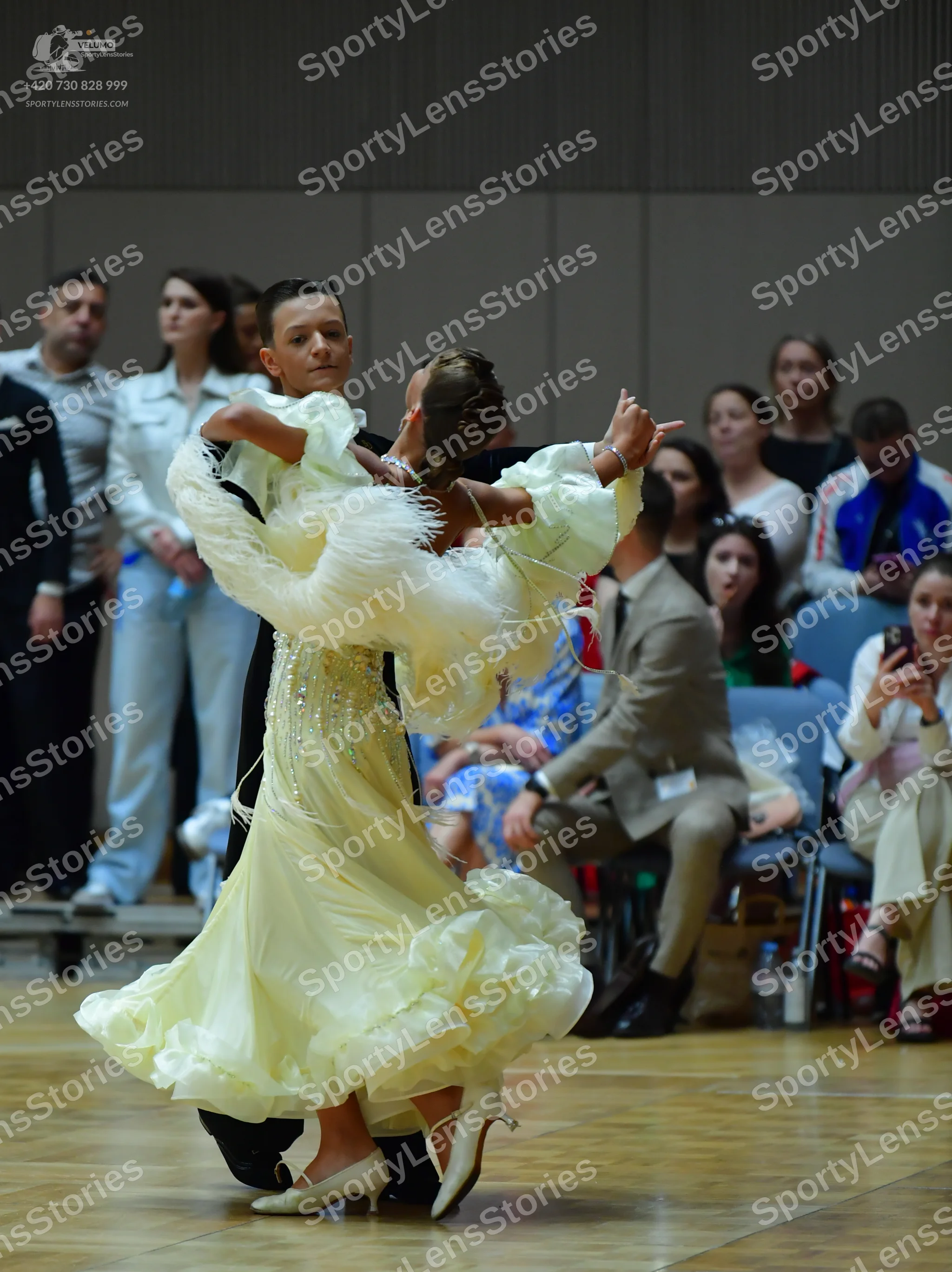 Dancesport competitor: Male dancer: black suit