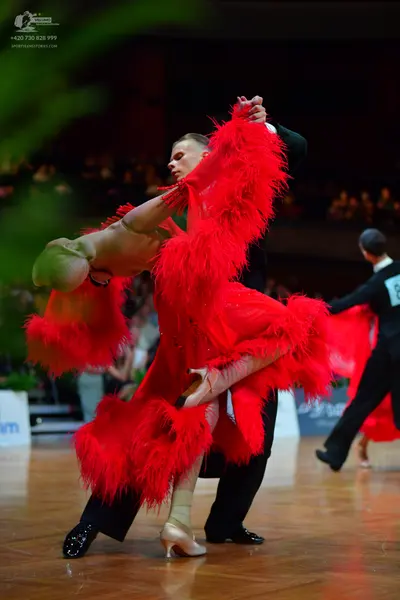 Dancesport competitor #81: Male dancer (center): black suit and black dance shoes