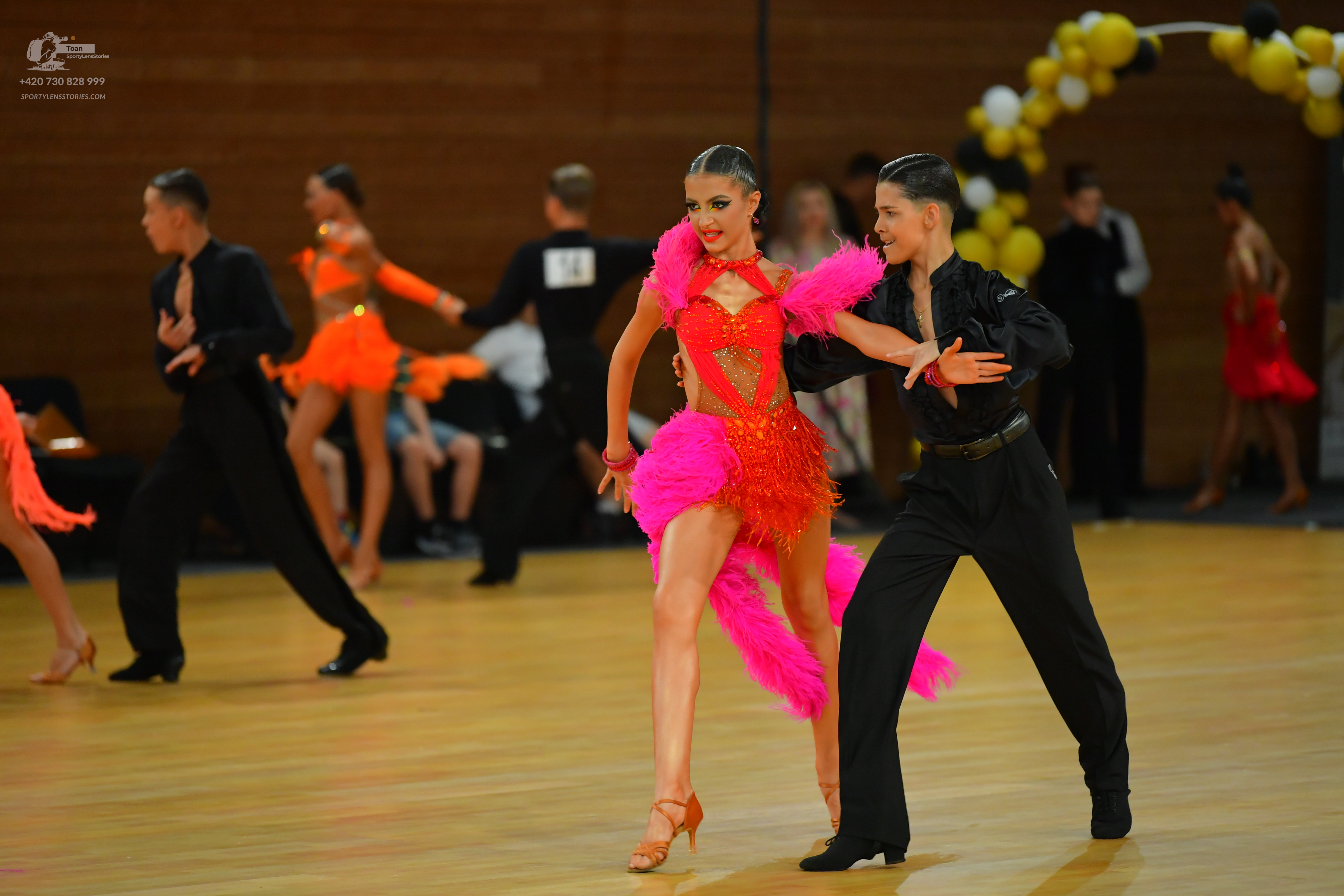 Dancesport competitor: ** Red Latin dress