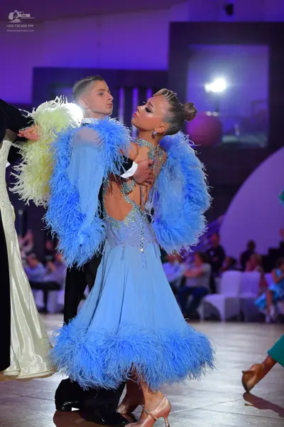 Dancesport competitor: Male dancer: black formal suit