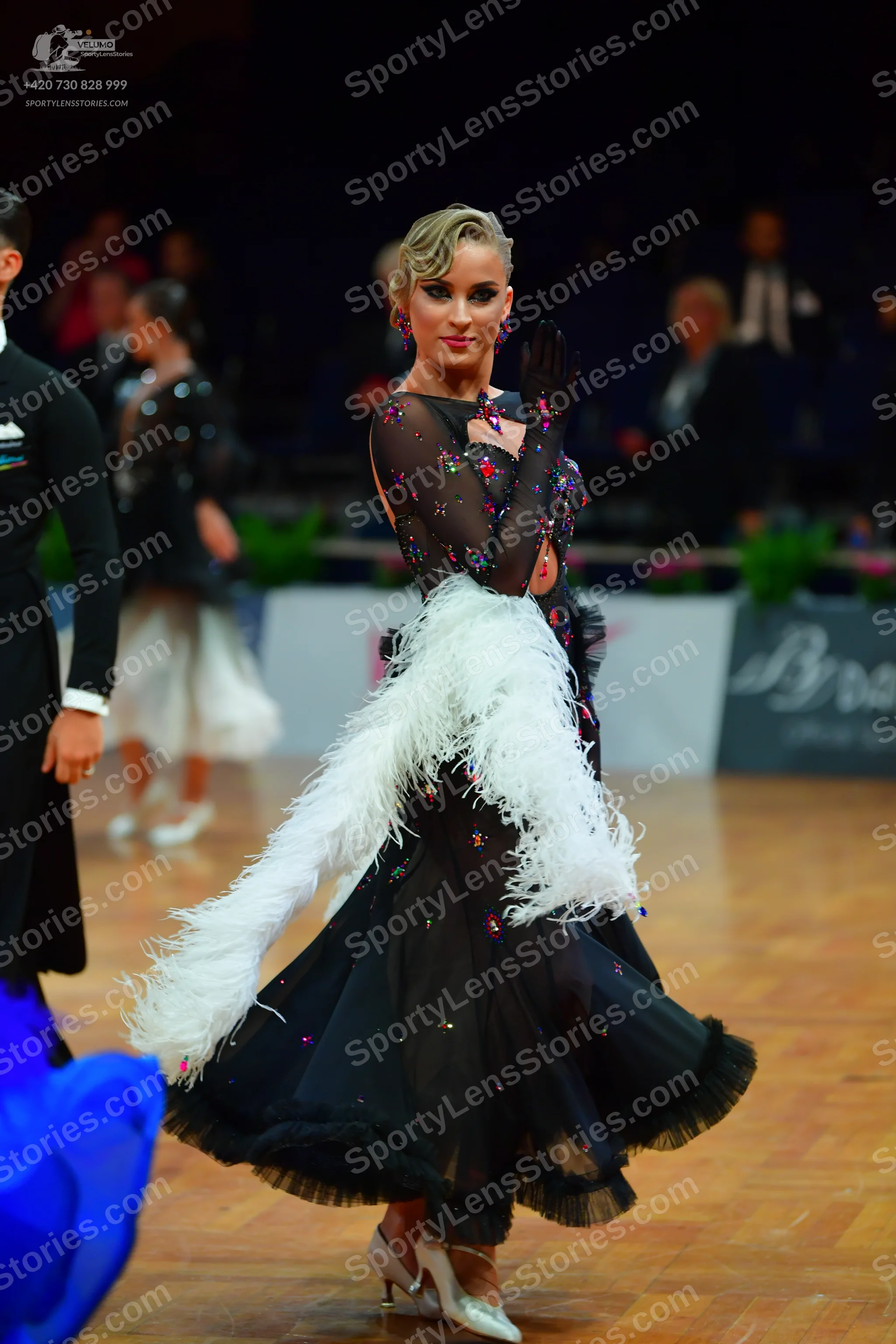Dancesport competitor: Male dancer: black suit