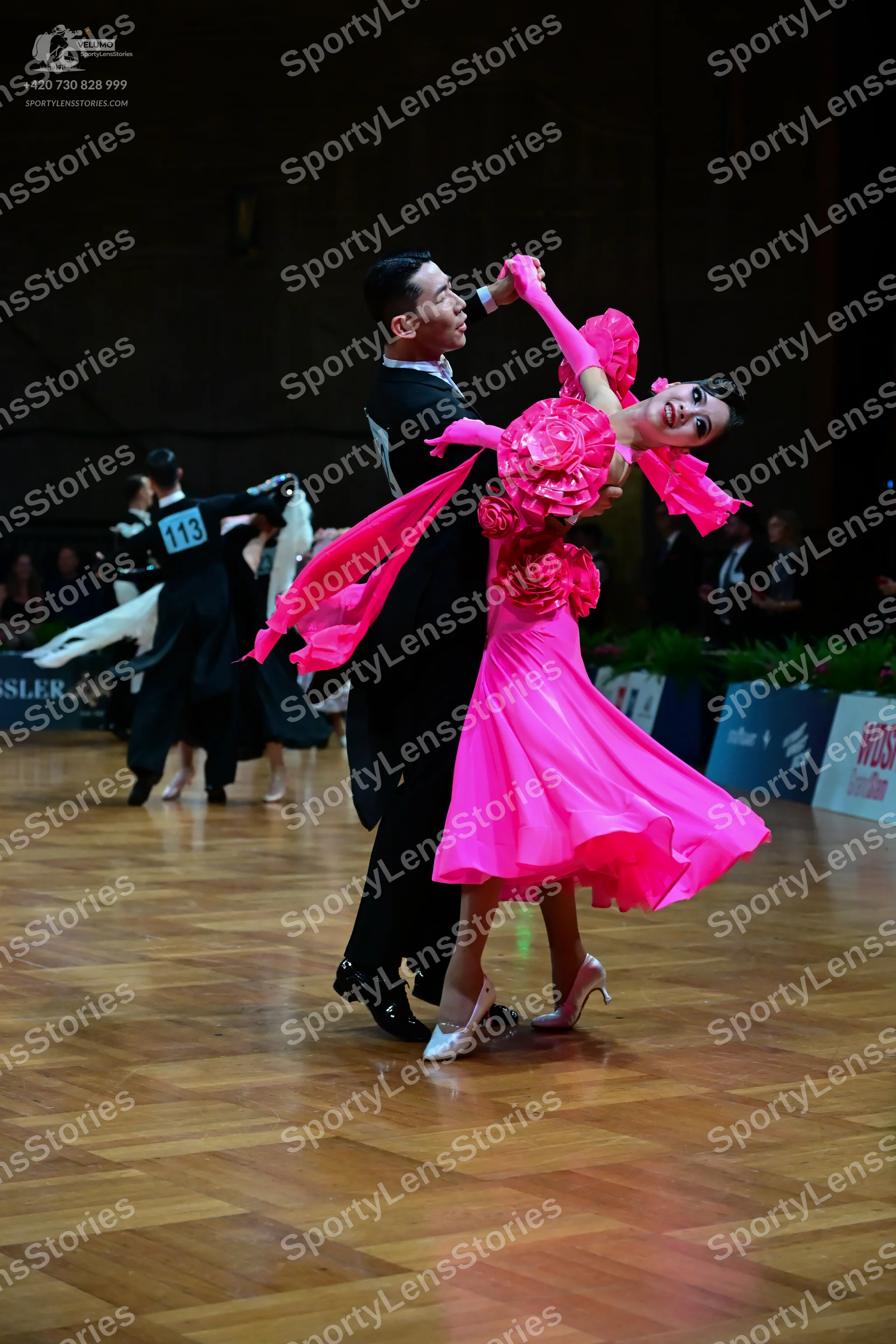 Dancesport competitor #113: Male dancer: black suit with a white shirt