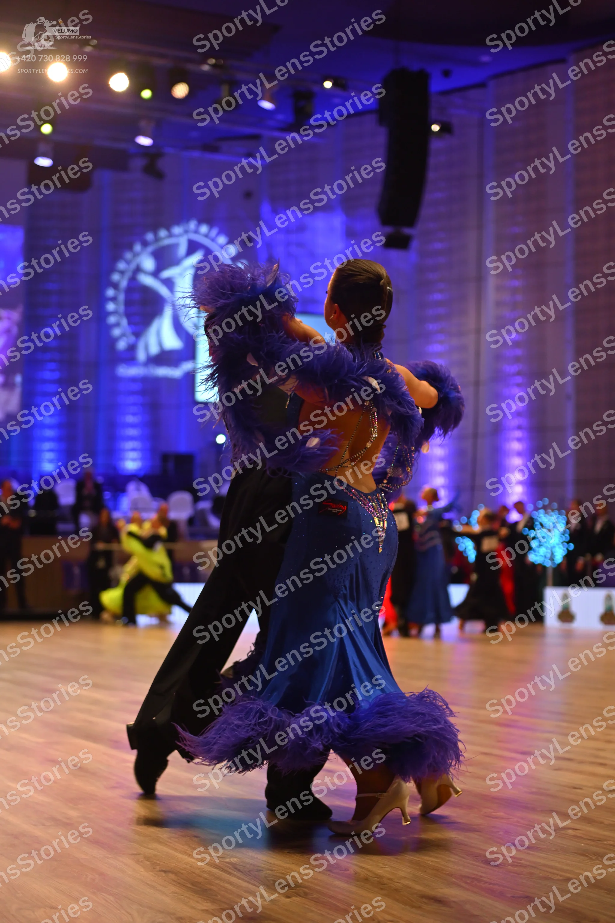 Dancesport competitor: Male dancer: black suit