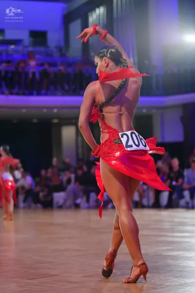 Dancesport competitor #206: Female dancer: red latin dress