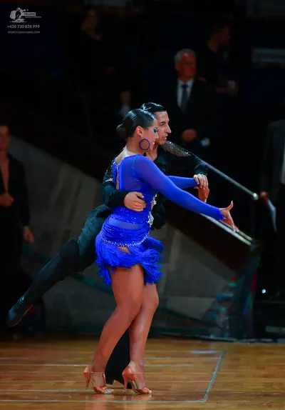 Dancesport competitor: Male dancer: black suit