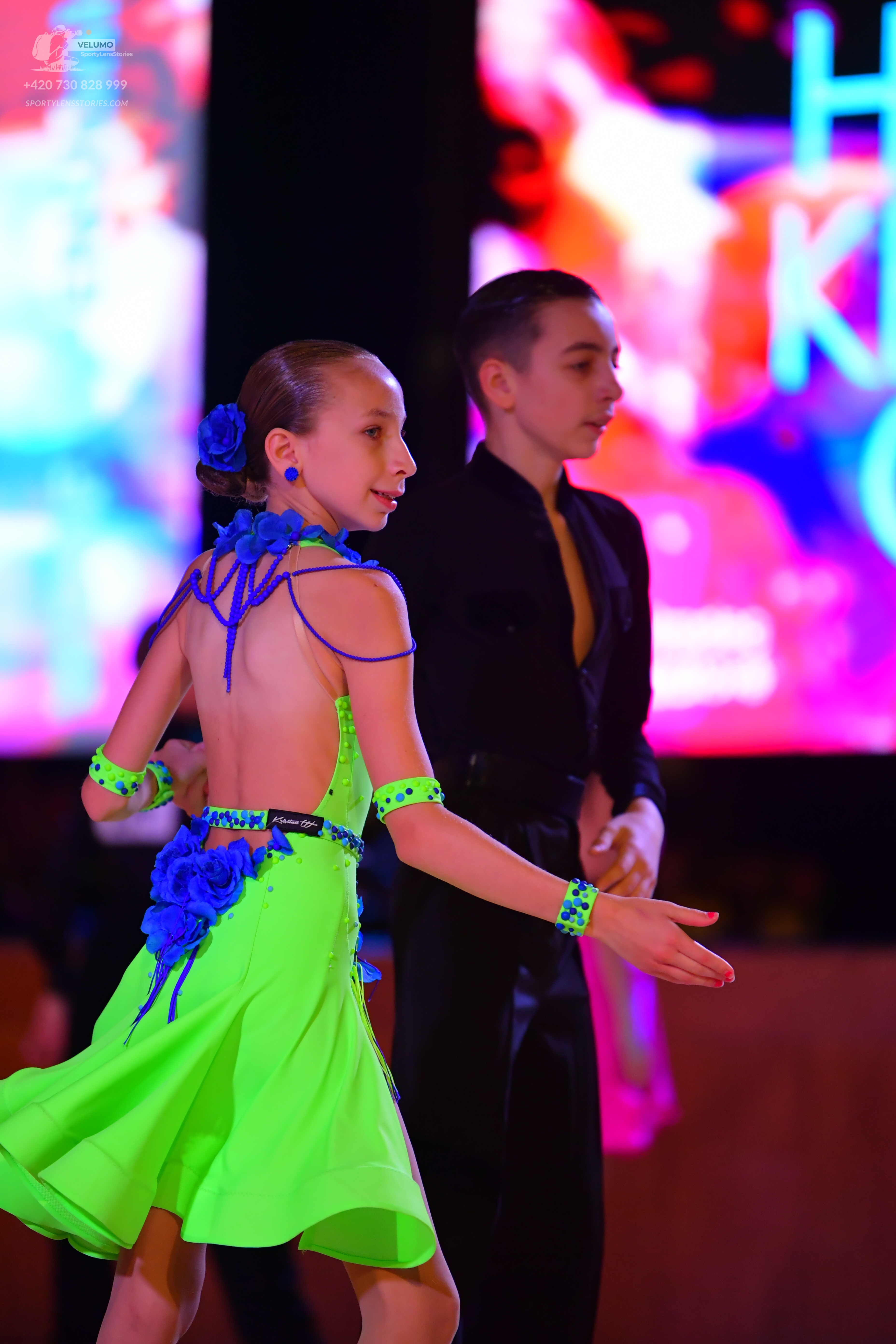 Dancesport competitor: Male**
*   **Color:** Black
*   **Fabric:** Tail suit with sequin lapels