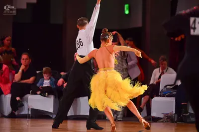 Dancesport competitor #286, #41: Male dancer: white long-sleeved shirt and black trousers
