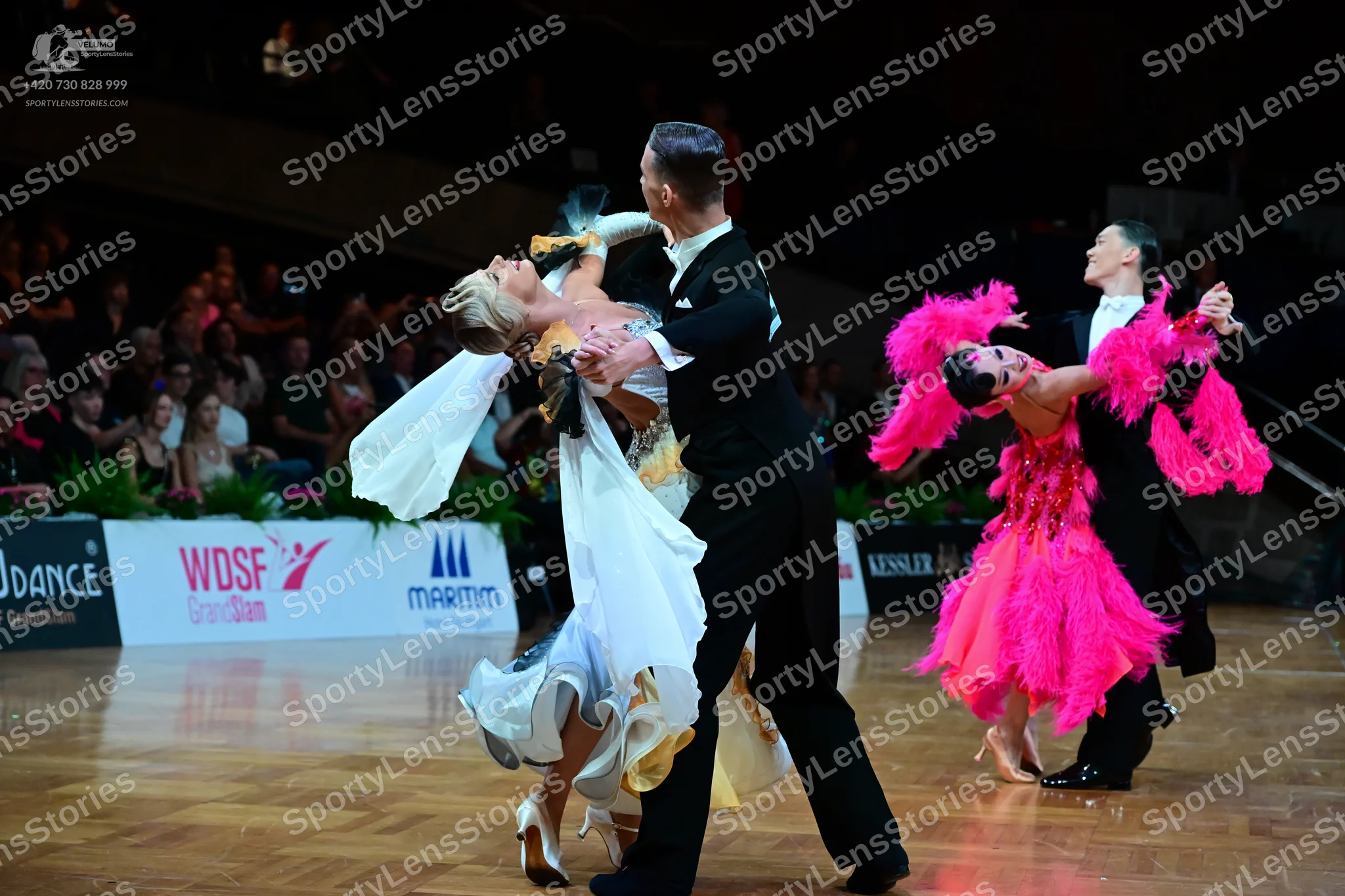 Dancesport competitor: Male dancer 1: black suit with a white shirt