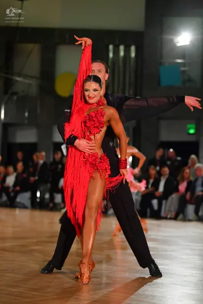 Dancesport competitor: Male dancer: black dance suit