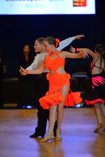 Dancesport competitor: ** Black suit with a sequin lapel