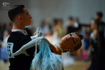 Dancesport competitor #55: Male dancer: black long-sleeved top
