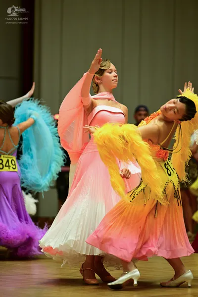 Dancesport competitor #349: ** Light pink, flowing latin dress with ruffled sleeves