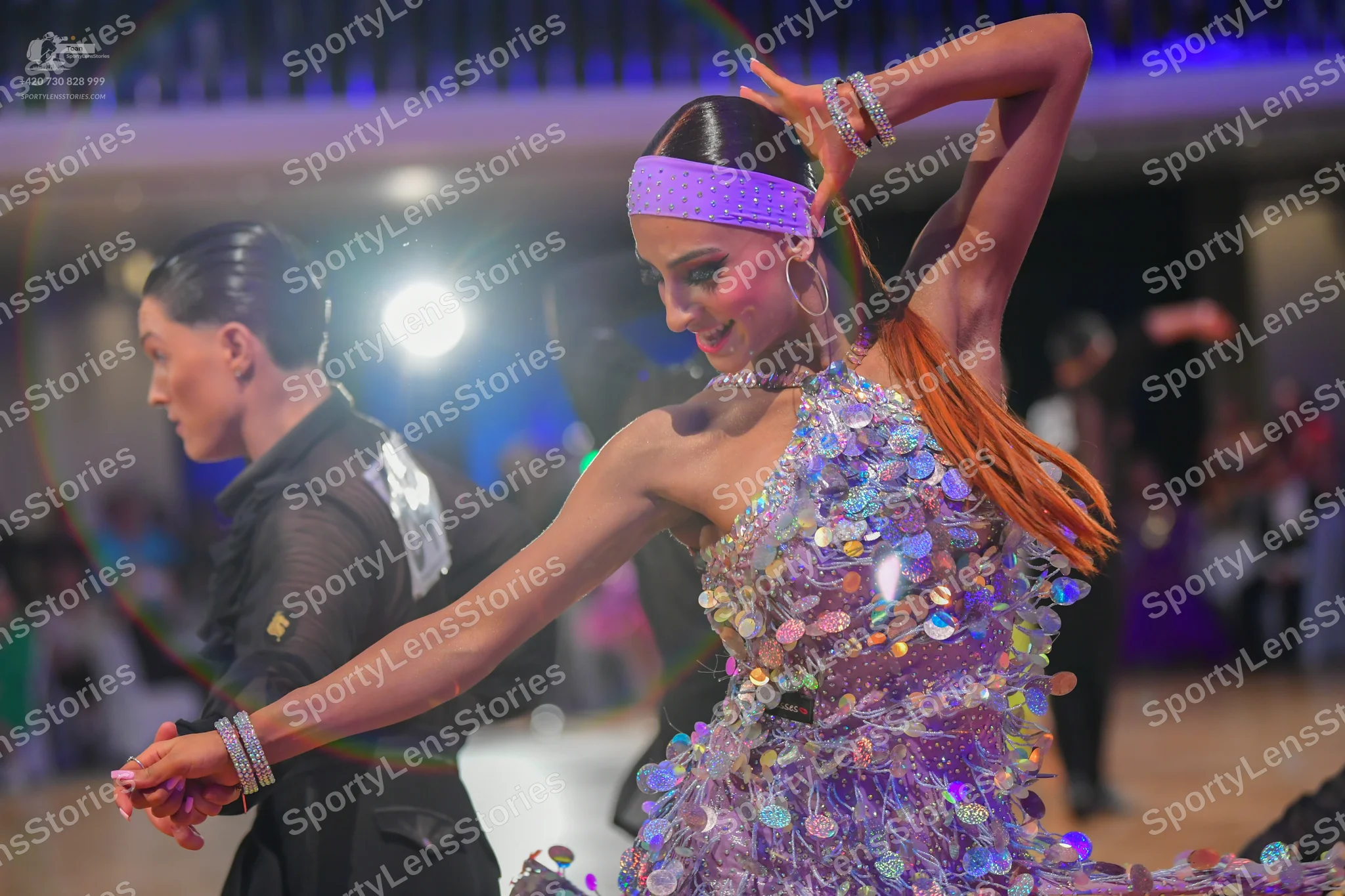 Dancesport competitor: Male dancer: black suit