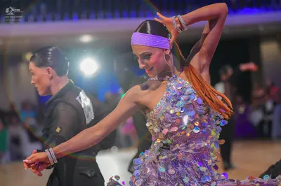 Dancesport competitor: Male dancer: black suit