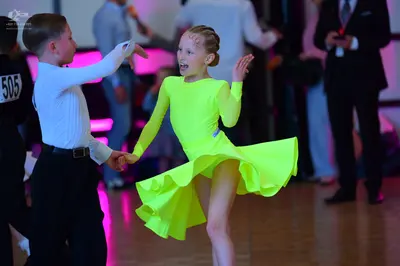 Dancesport competitor #505: Male dancer: white long-sleeved shirt and black trousers