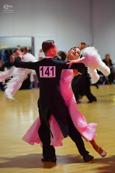 Dancesport competitor #141: Male dancer: black tailcoat, white shirt, and black trousers
