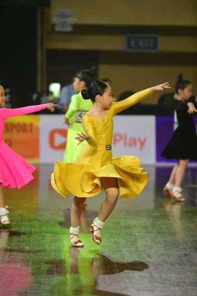 Dancesport competitor #78: Female dancer: bright pink latin dress