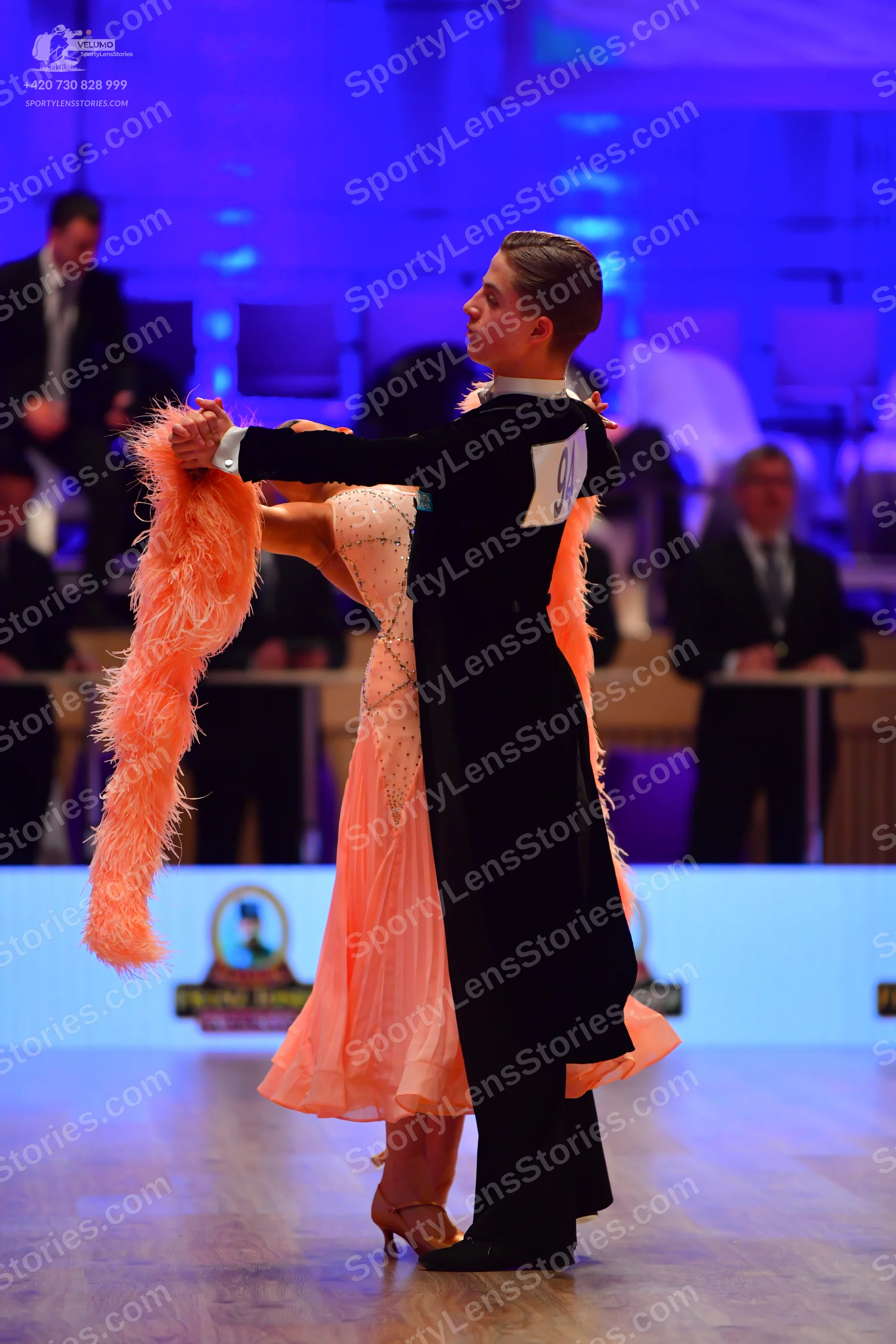 Dancesport competitor: Male dancer: black ballroom suit
