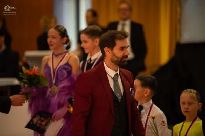 Dancesport competitor: Female dancer: lavender ballgown dress with ruffled fabric