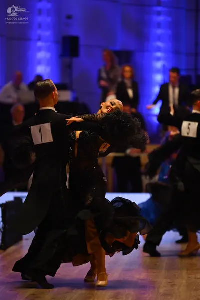 Dancesport competitor: Male dancers: black suits