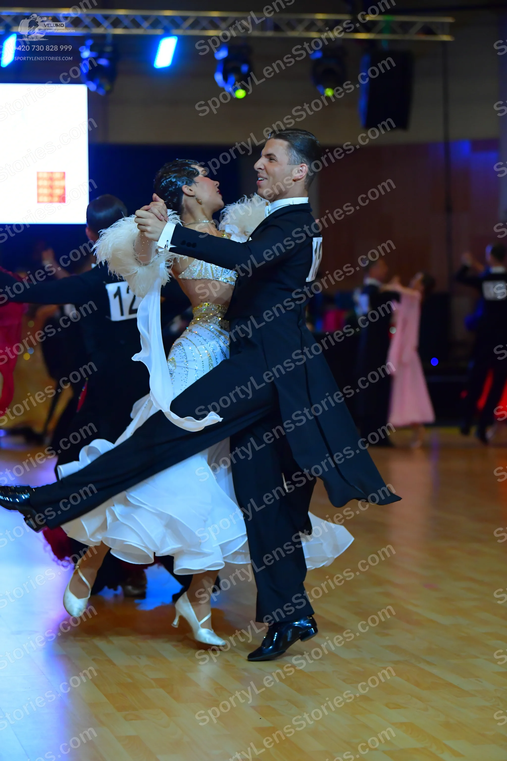 Dancesport competitor #12: Male dancer: black tailcoat, white shirt, and black trousers
