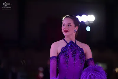 Dancesport competitor: Female dancer: purple latin dress with dark purple/blue sequins and embellishmen