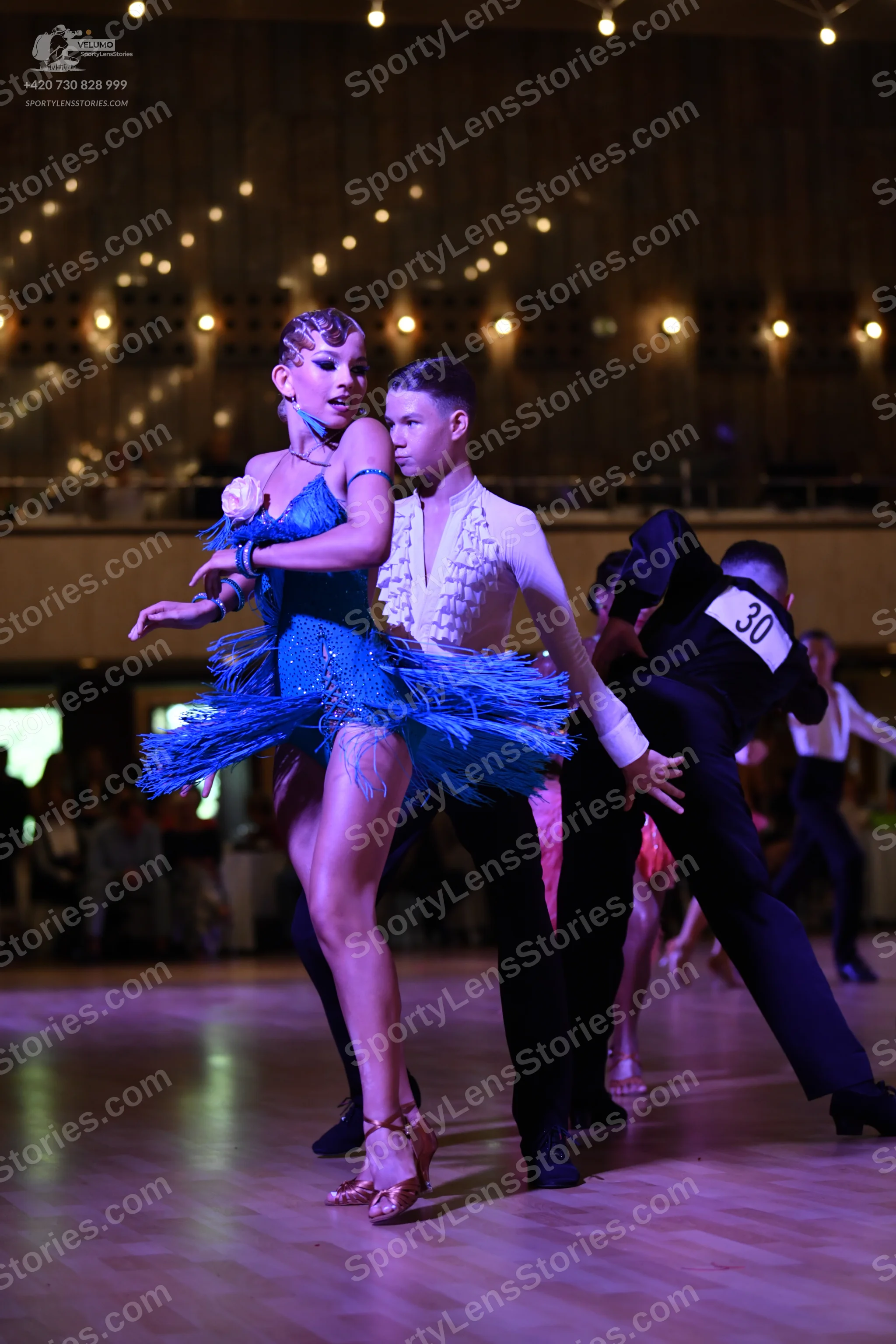 Dancesport competitor: ** Black suit with sequin lapels