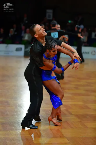 Dancesport competitor #41: Male dancer: black short-sleeved shirt and black trousers