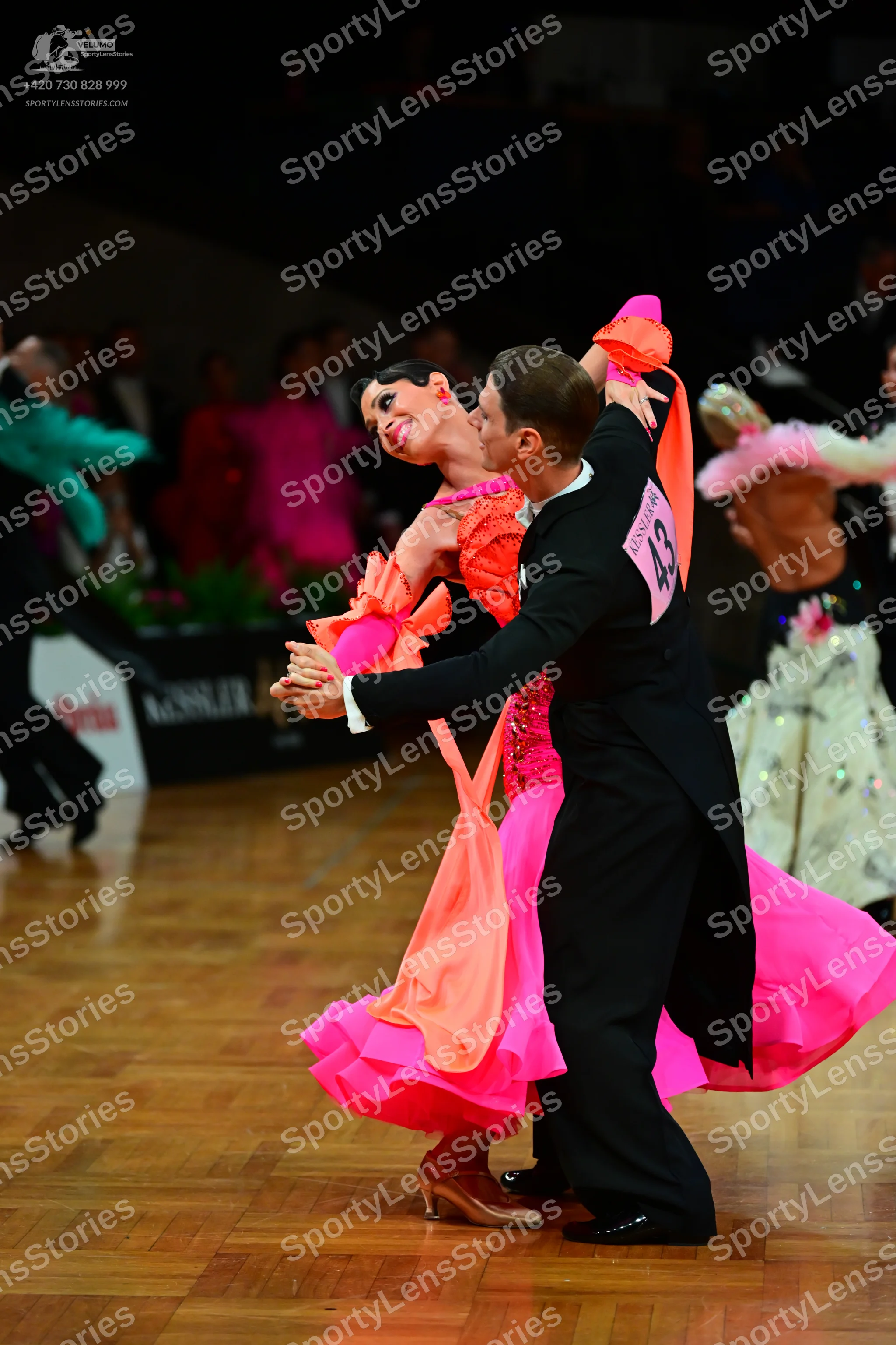 Dancesport competitor #43: Male dancer: black ballroom suit with a white shirt and black trousers