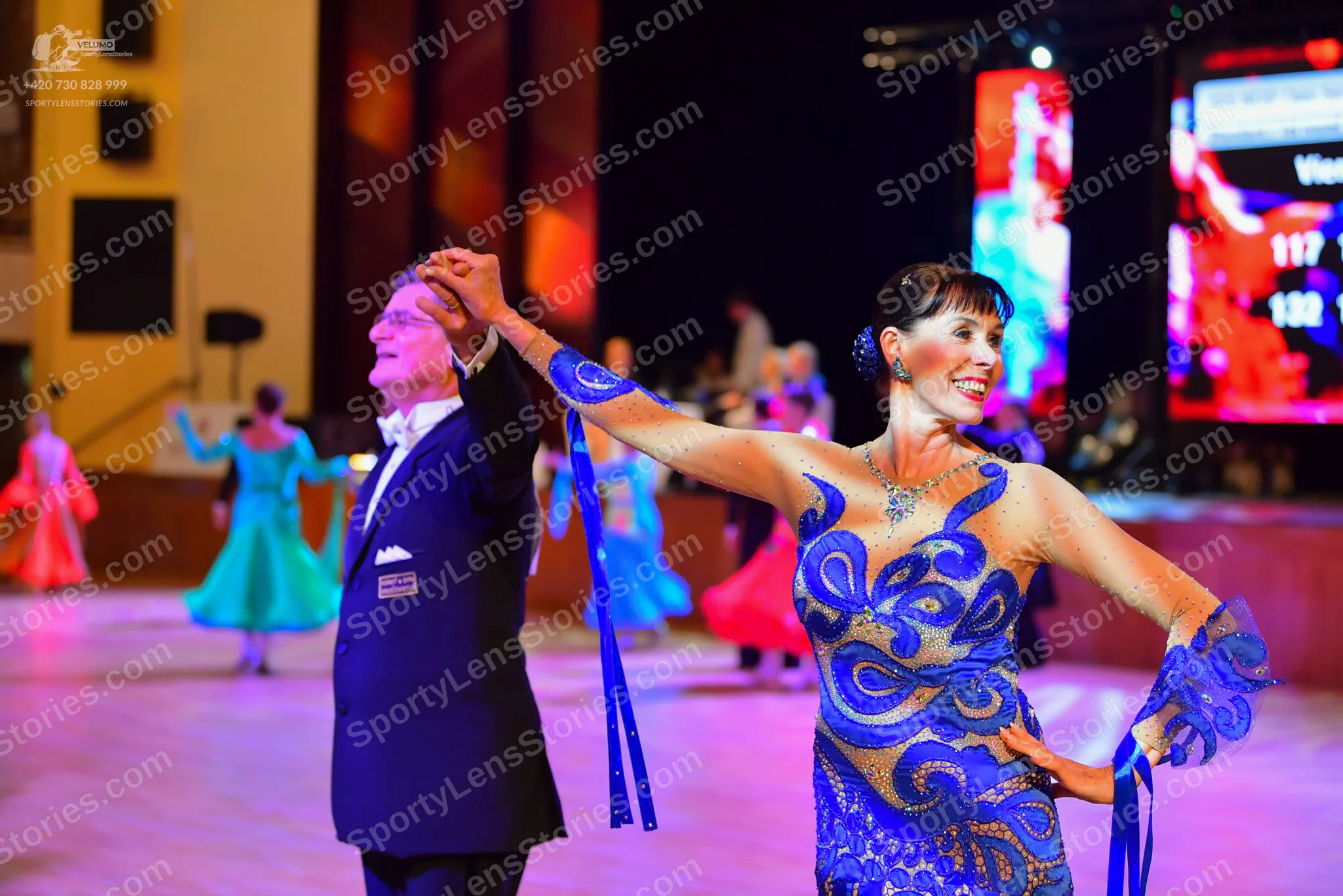 Dancesport competitor: Male**
*   **Color:** Black
*   **Fabric:** Sequin (appears to be a shimmering b