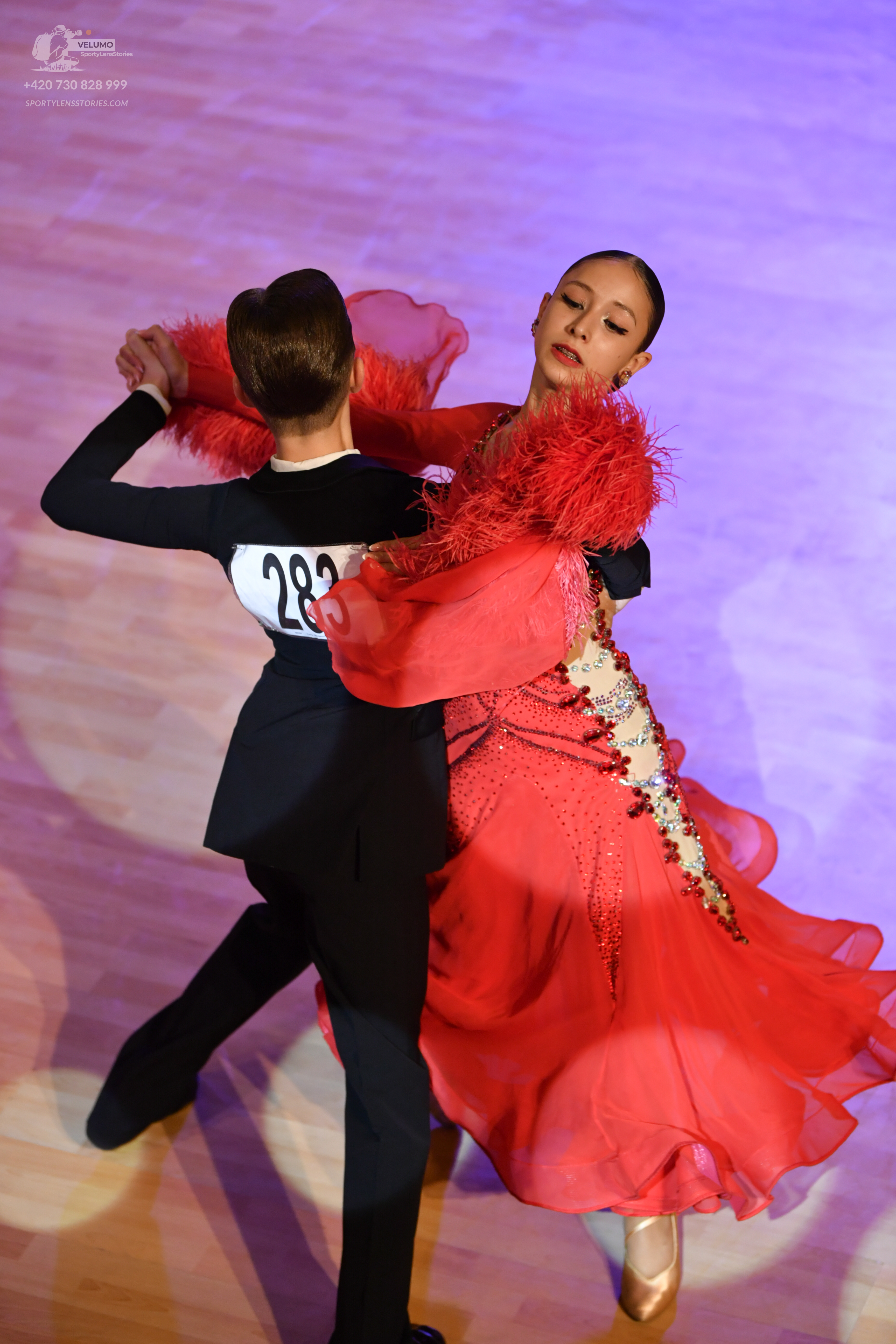 Dancesport competitor: ** Black suit with sequin lapels