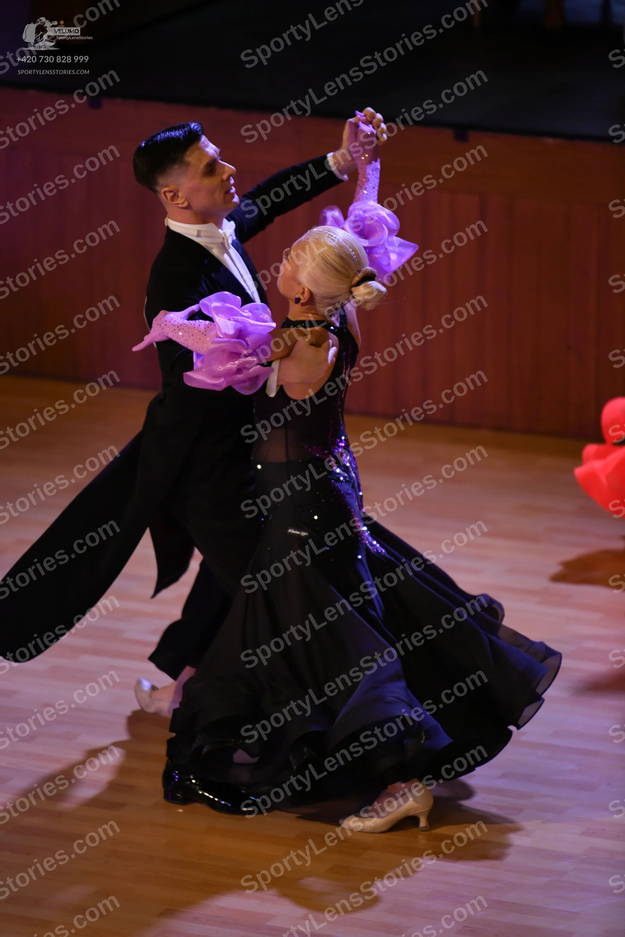 Dancesport competitor: Male dancer: black tailcoat suit with a white shirt and bow tie