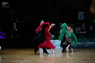 Dancesport competitor: Male dancer 1: black suit