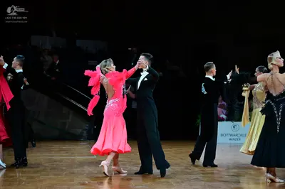 Dancesport competitor: Male dancers: black suits