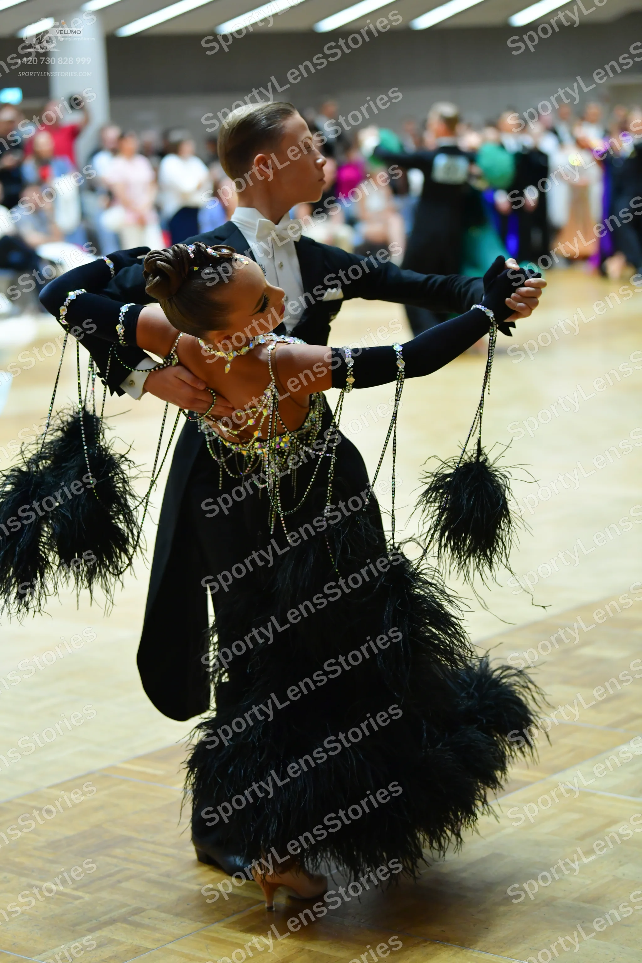 Dancesport competitor: Male dancer: black tailcoat with a white shirt and white bowtie