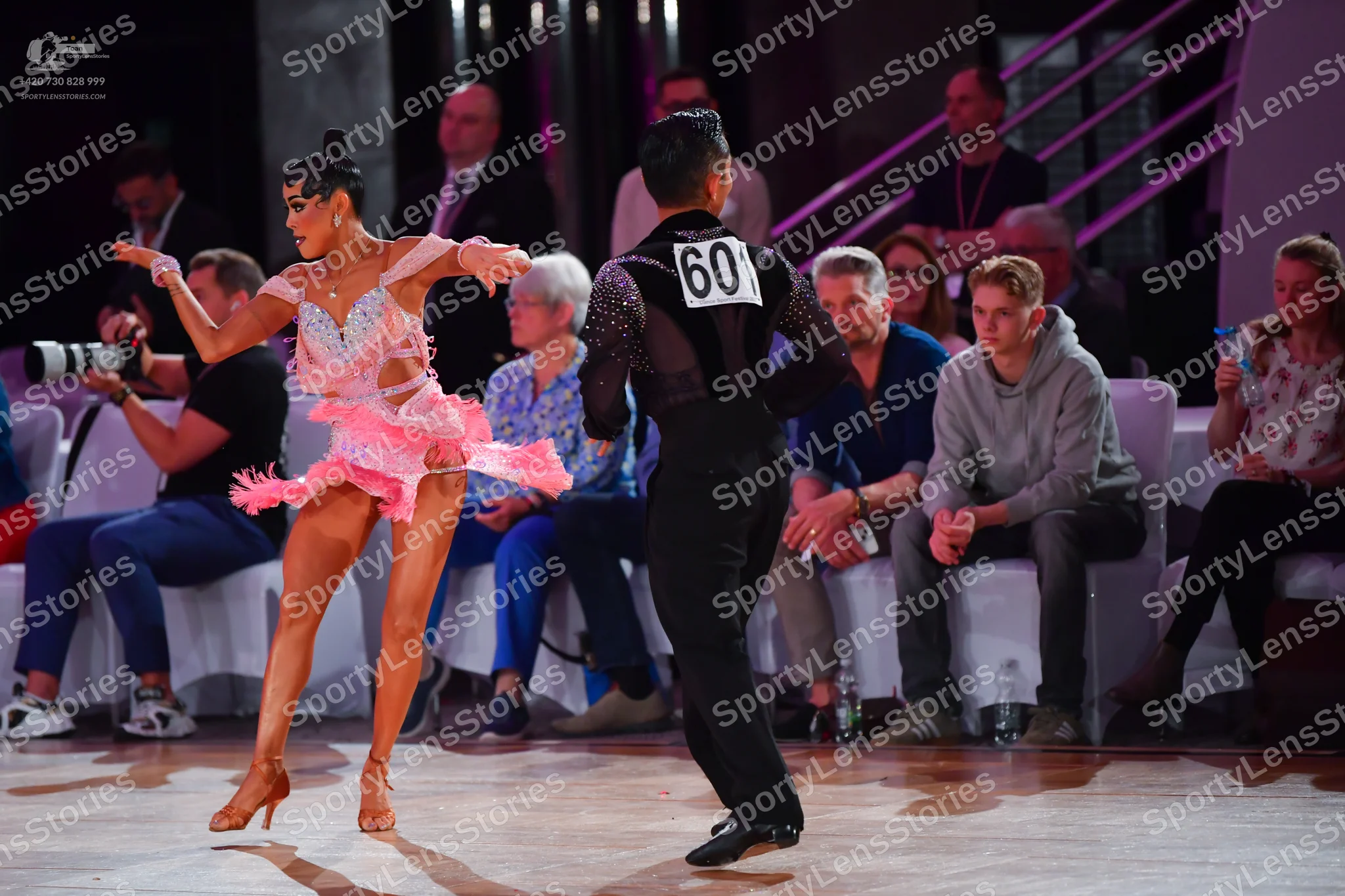 Dancesport competitor #601: Female dancer: pink Latin dance dress with sequins and lace