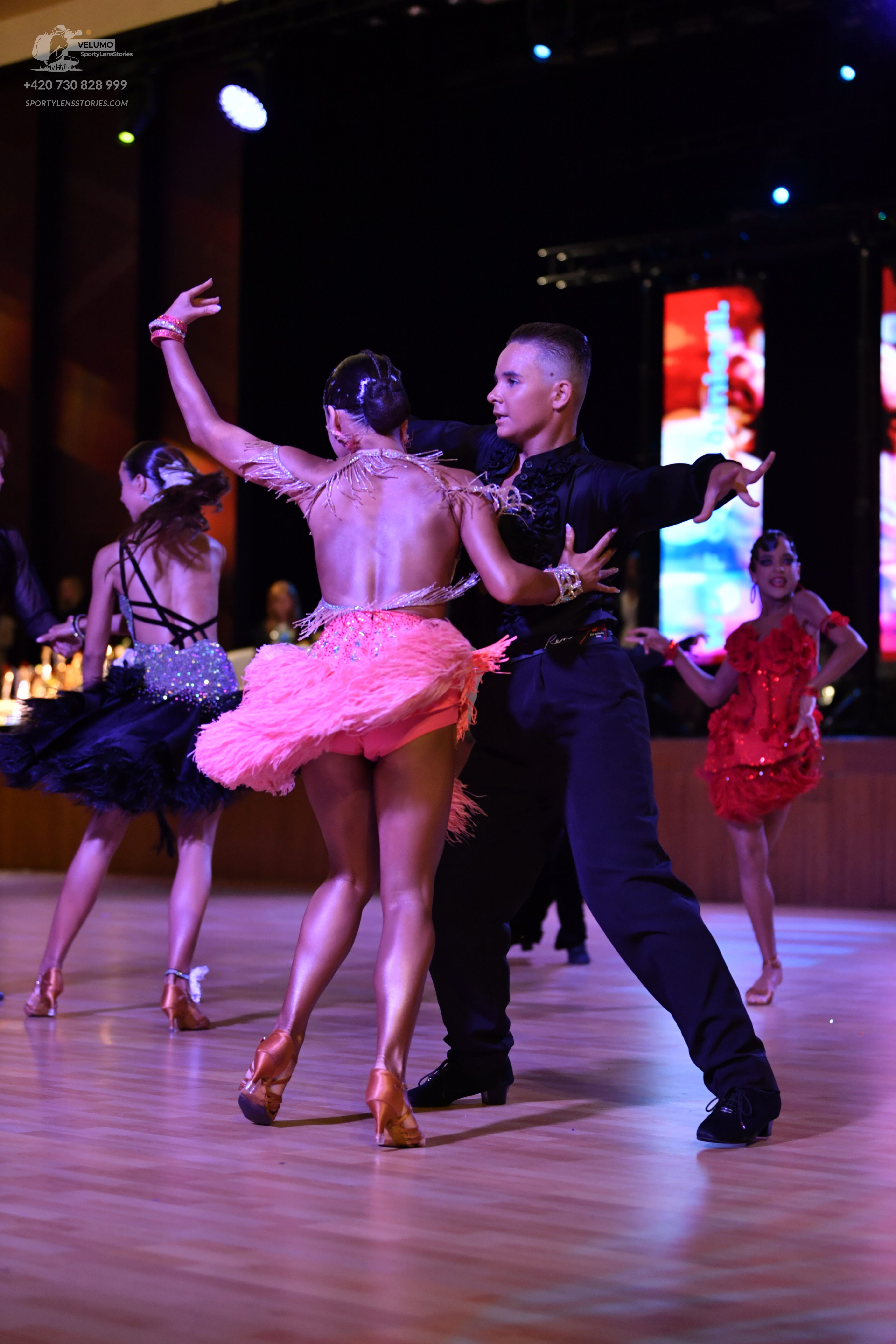 Dancesport competitor: ** Black suit with a subtle sequin pattern on the lapels