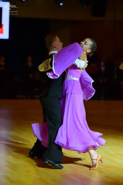 Dancesport competitor #23: Male dancer: black suit with a white shirt and black bowtie
