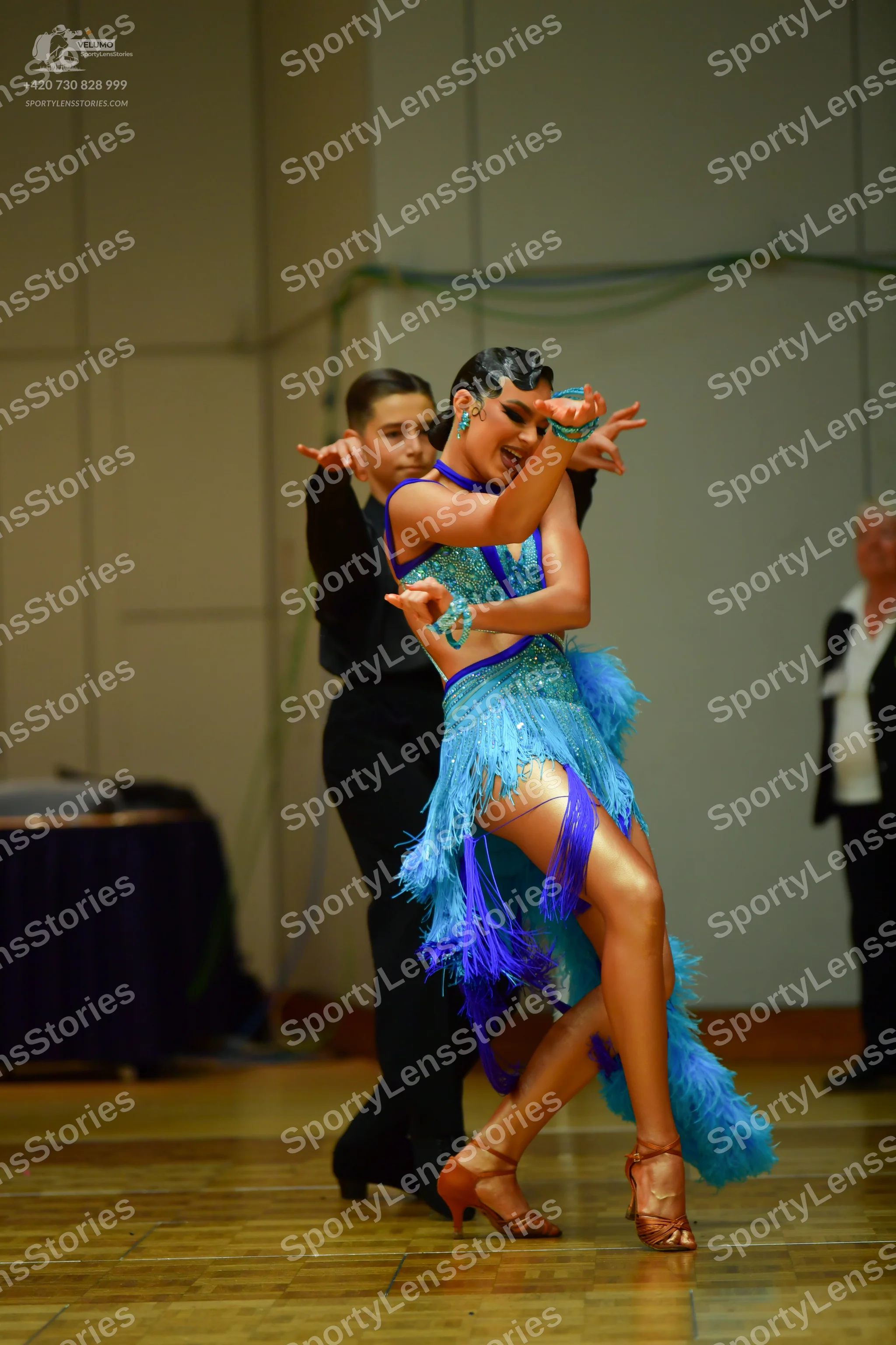 Dancesport competitor: Male dancer: black long-sleeved shirt and black trousers