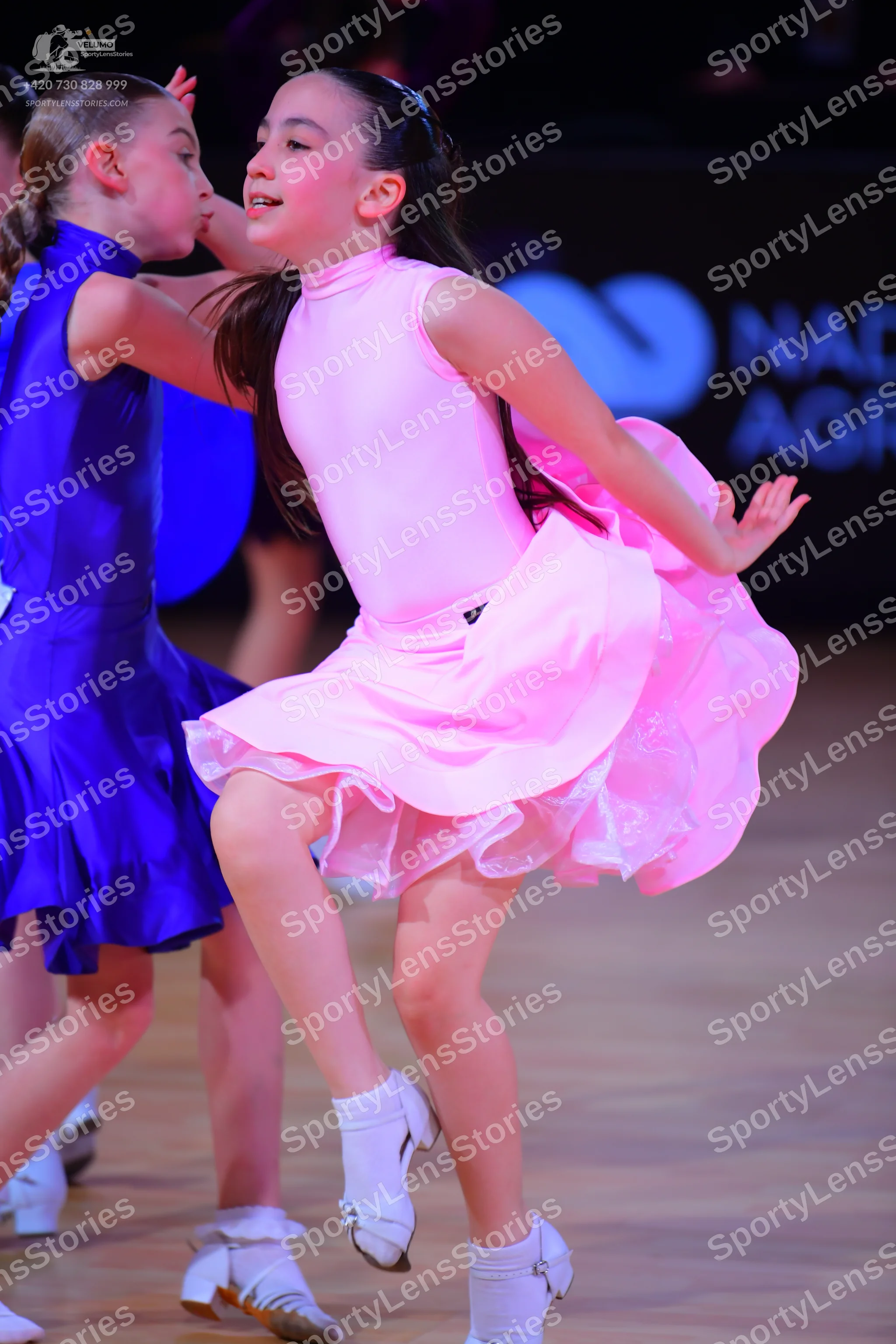 Dancesport competitor: Female dancer 1: royal blue latin dress