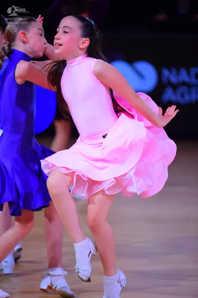 Dancesport competitor: Female dancer 1: royal blue latin dress