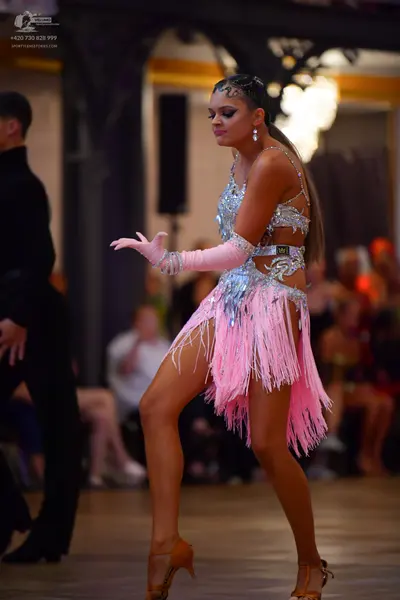 Dancesport competitor: Male dancer: black suit