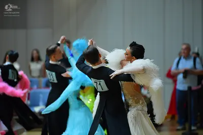 Dancesport competitor #33, #71: Male dancers: black suits