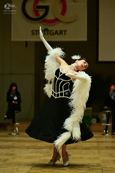Dancesport competitor: ** Black ballgown style dress