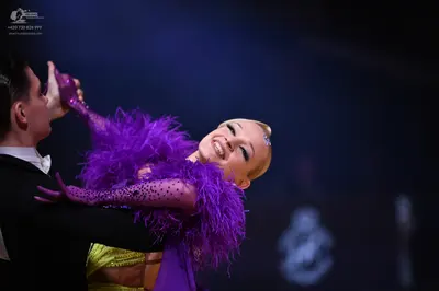 Dancesport competitor: Male dancer: black suit
