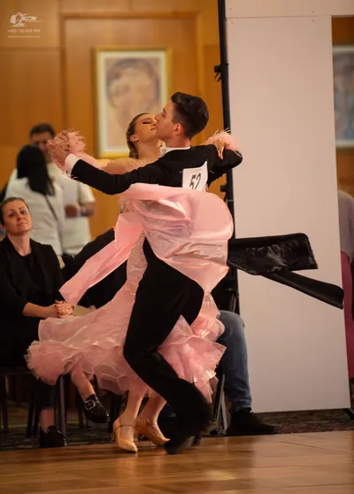 Dancesport competitor #52: Male dancer: black long-sleeved top and black trousers