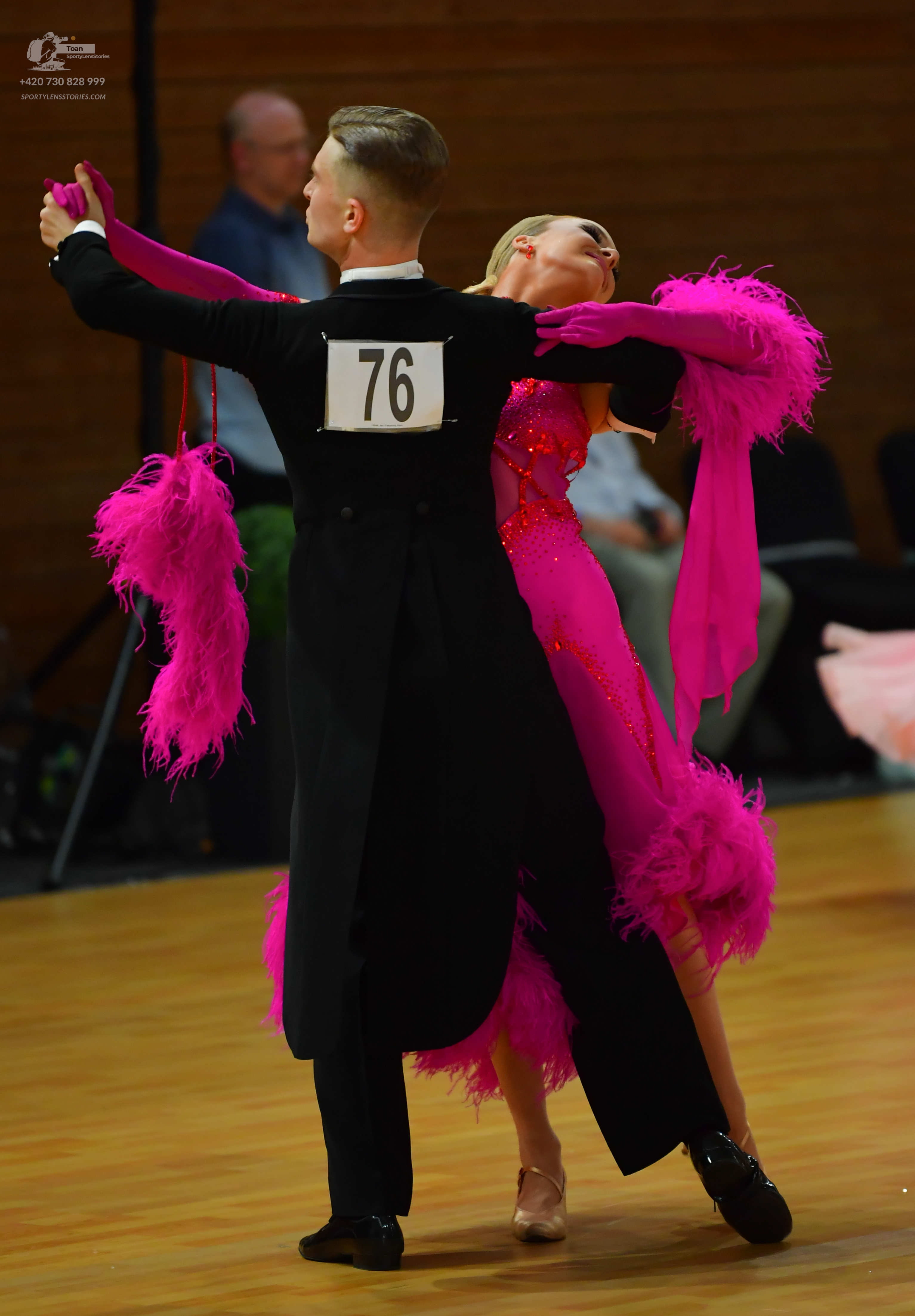 Dancesport competitor #76: ** Male: Black tail suit with black satin lapels, and a subtle, dark-colored seq